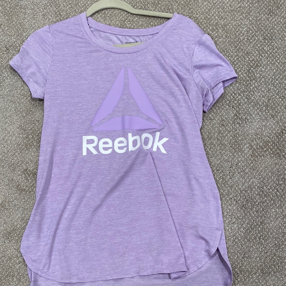 Under armor and rebook purple tee shirts great for work out
